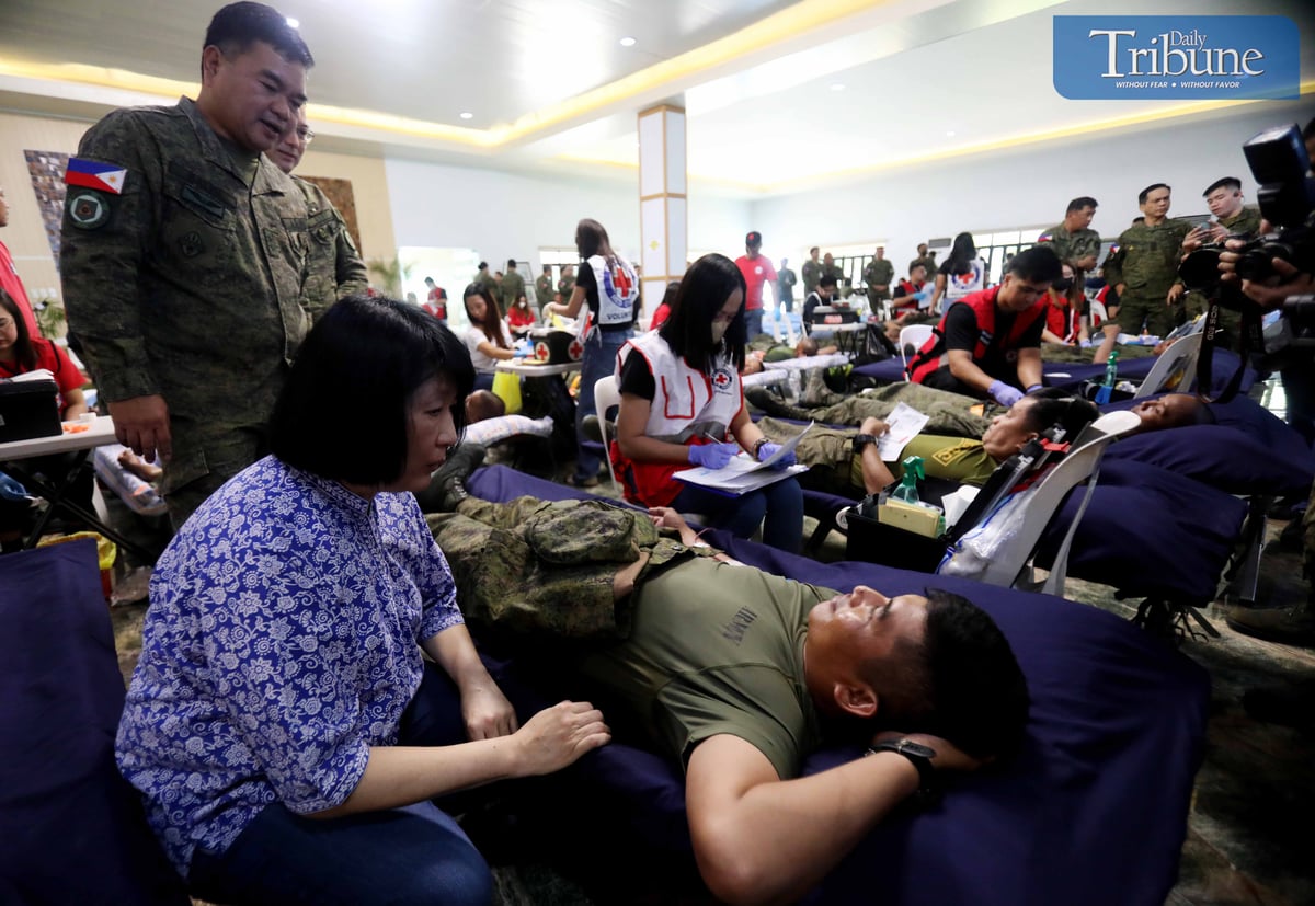 (August 25 2024)…………During the 2nd Nationwide Bloodletting Program on sunday, August 25, 2024, at the Armor Division (Pambato) Clubhouse in Camp O'Donnell, Capas, Tarlac, Dr. Isa Suntay expresses gratitude to the Philippine Army members who donated blood. Thousands of people gave blood at the event. With the assistance of the Tarlac Heritage Foundation, the event seeks to significantly improve the country's blood supply and raise awareness of the value of voluntary, non-remunerated blood donation……..Photo/Analy Labor